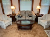 White chairs, sofa, glass top table, end tables, lamps