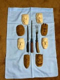 Cutlery set, carved miniature masks