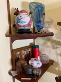 2 Shelves of assorted items including jar, glass face
