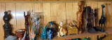 Shelf lot of tribal carvings, art and more