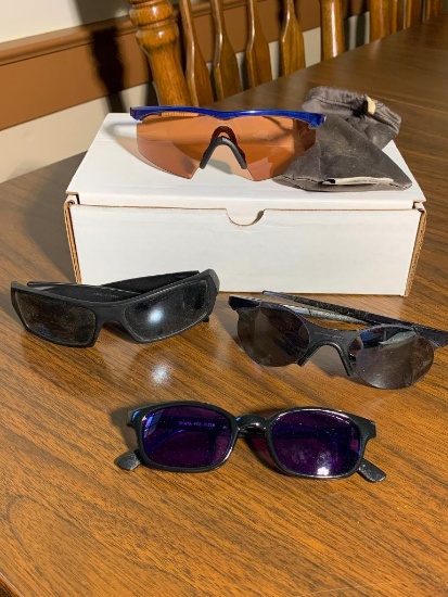 Group of Sunglasses including Oakley