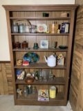 Basement Shelf with Decorative Items - Spiderman Puzzle, Vintage Bottles & More