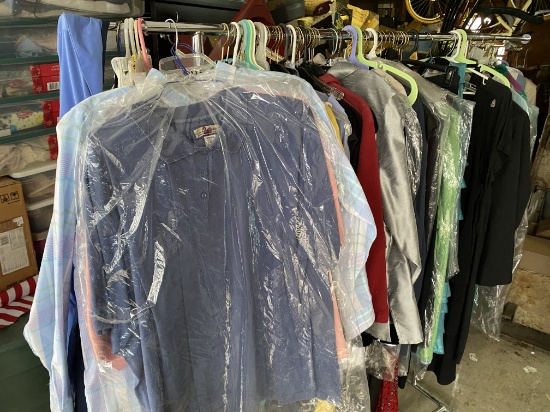 Rack of clothing including vintage dresses, jacket