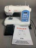 Singer Curvy 8780 Sewing Machine.  Has Foot Pedal.  Powered On