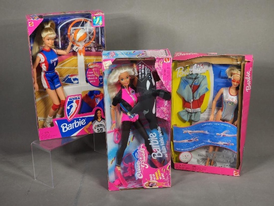 WNBA Barbie, Ocean Friends Barbie with Dolphin, and Swimming Champion Barbie