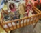Child's Crib and Group of Collectible Dolls