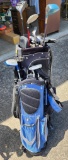 Two Golf Bags with Clubs