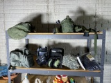 Two Shelves of Military Items including Kevlar Helmet