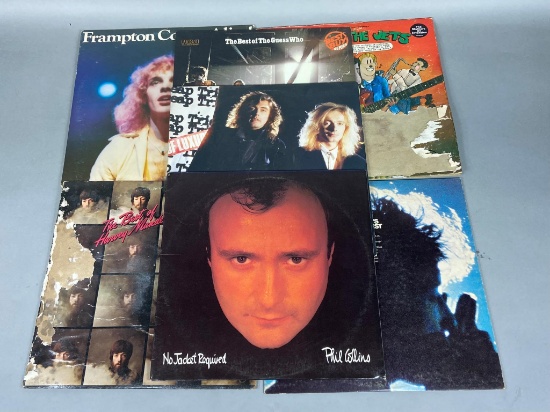7 Vintage LPs featuring Bob Dylan, Phil Collins and More!