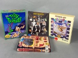 4 Computer Games including Day of The Tentacle. Cartooners. Mother Goose, and Simcity