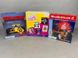 3 Computer Games including World Circuit, Game Pack, MegaTraveller 2