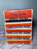 Five Lionel Train Switches