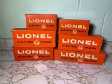Six Lionel Trains - Two Caboose, Two Missile Launching Flat Car,