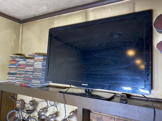40" Philips Television with Remote + Rock CDs Collection