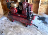 Gasoline Powered Air Compressor with Twin Tanks. Has Compression