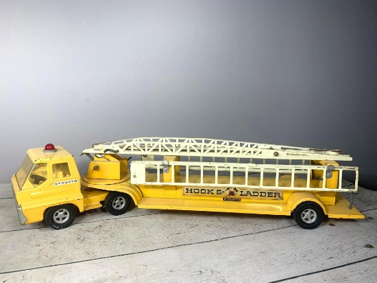 Vintage Structo Yellow Hook and Ladder Fire Truck Toy