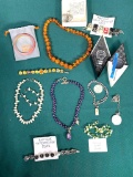 Group lot of better costume jewelry including sterling silver, amber