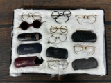 A Group of Antique Spectacles and Goggles With Some Cases