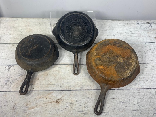 Three Vintage Cast Iron Skillets Including a Western