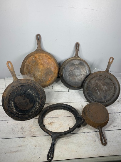 Group of Cast Iron Skillets and one Riser including a Wagner Ware and Others