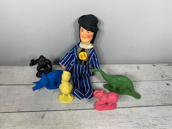 Four Vintage Sinclair Gasoline Dinoland Figures and a Clyde Doll