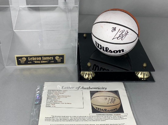 LeBron James signed mini basketball, full JSA letter in a special display case