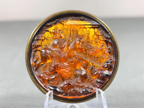 Relief-Molded Amber Celluloid Button Depicting Genghis Khan on Horseback