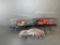 Radio Control Car with Clear Body and Two Radio Controlled Racing Motorcycles in Cases
