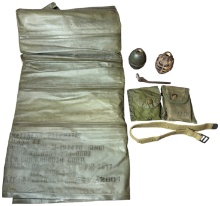 A Collection of US Military Equipment and Inert Training Ordnance Including a 1959 Pneumatic Mattres