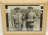 Vintage photo of 2 gentlemen, 1 wearing Winchester