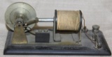Early electric toy motor w/knife switch,
