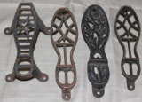4 cast iron shoe shine foot rests approx 10