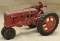 Hubley tractor in red paint showing paint loss