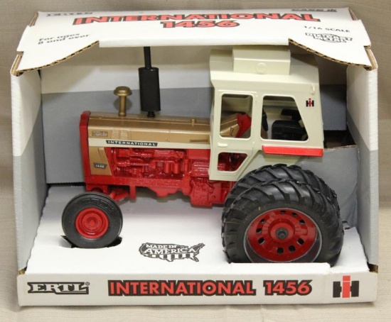 International 1456 Gold Demonstrator tractor;