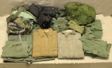asstd lot of military clothing throughout the