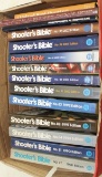 box containing 11 Shooter's BIbles plus 4 books