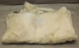 White fur cow hide tanned, showing some wear