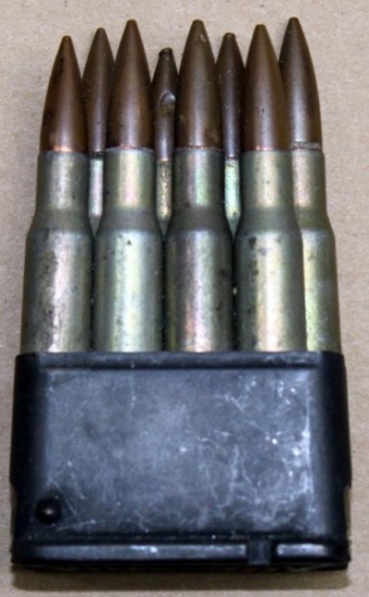 8 drilled dummy/practice .30-06 Sprg rounds in an