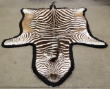Zebra rug/wall hanging showing slight wear,