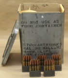 tin containing 31 en-bloc clips, each holding