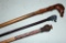 2 figural walking sticks & cap firing bang stick -