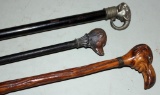 3 figural walking sticks -- metal elephant 34.5