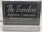 The Travelers Insurance Company glass lighted