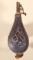 Embossed leather shot flask with hanging Small Game.  Spout is marked Amf Lasno Cap Co.
