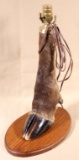 moose leg and hoof table lamp on oak board