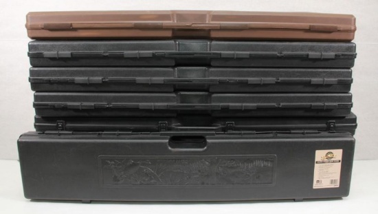 8 assorted hard sided padded gun cases, 4 are Kolpin
