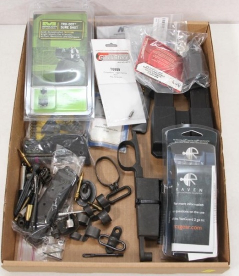 Flat lot assorted rifle parts, grip caps, peep sights, floor plates, magazines, mag holders.