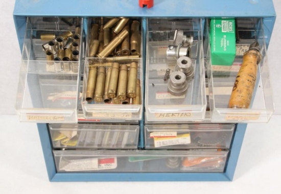 Parts bin full of assorted reloading supplies, cleaning supplies and more.