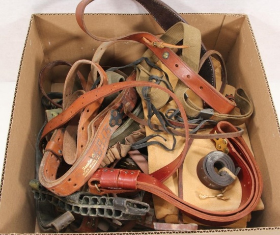 Flat lot of assorted leather slings and leather.