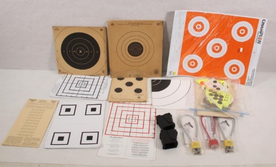Lot to include - 2 UpLULA 9mm to 45 ACP loader/unloaders, gun locks & assorted targets